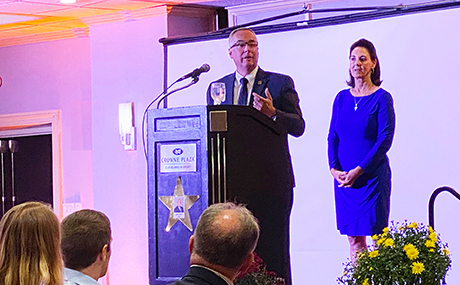 Photo of BW President Bob Helmer speaking at the Grindstone Legacy Award ceremony.